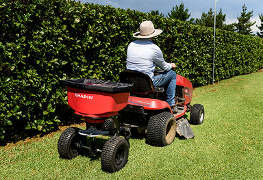 70kg Tow Behind Mower Spreader action
