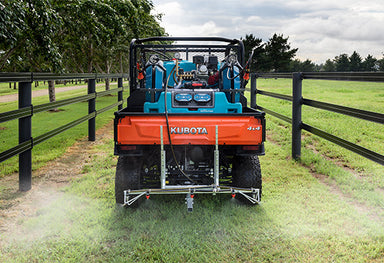 Versatile Boom w Hitch Mount action back of utv spraying