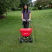 Earthway 2050P Broadcast Spreader in use on grass