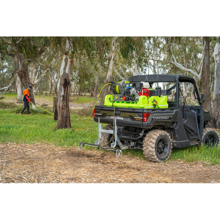 Hose spraying from a Polaris UTV in bushland with the OnDeck 300L sprayer
