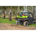 Hose spraying beside a UTV with the OnDeck 300L sprayer in bushland