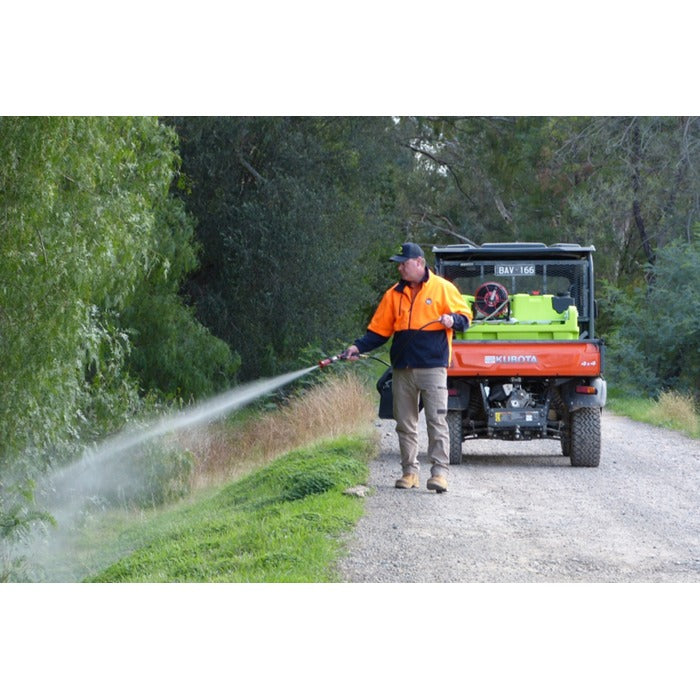 Spraying a roadside with the OnDeck 300L Honda GX35 UTV sprayer