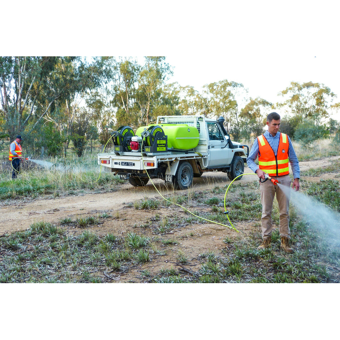 SuperReel 400L Short Twin Reel Slip On Field Sprayer operator spraying