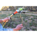 SuperReel 500L Twin Reel Slip On Field Sprayer spray gun in use