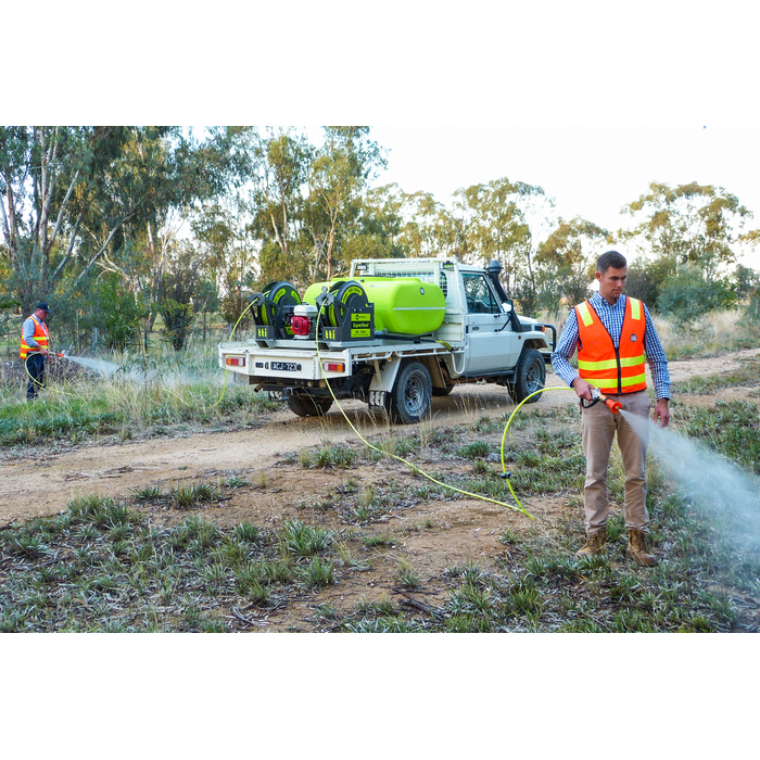 SuperReel 600L Twin Reel Slip On Field Sprayer operator spraying