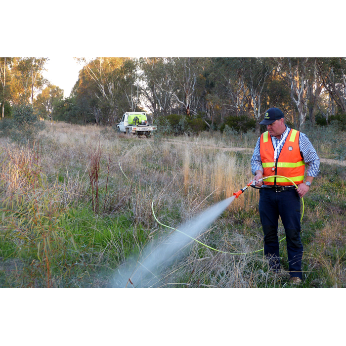 SuperReel 800L Single Reel Slip On Field Sprayer operator spraying